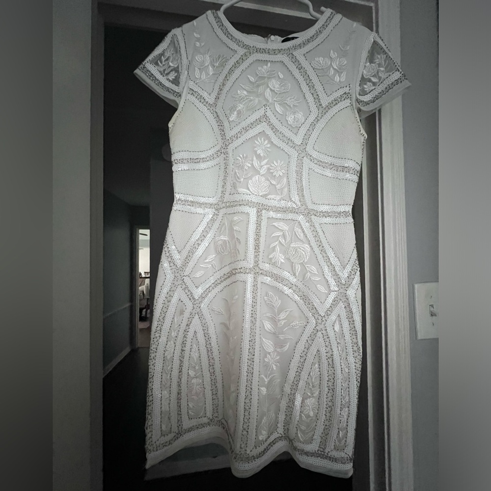 Lulu’s white beaded dress